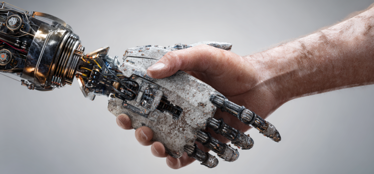 A human hand and a robot AI hand shaking hands